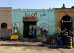 Cairo:Life in the deacity

Nargile-coffee shops next to a body shop that repairs hearses.
 © Maro Kouri