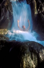 Greek Spas Fthiotida, Thermopyles Man under waterfall
 © Maro Kouri