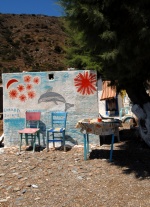 Greece, North Aegean,Fournoi, Hrisomilia. A naif graffity means ‘‘GREECE I LOVE YOU‘‘ is written on the wall of a summer little house, near the beach.
 © Maro Kouri
