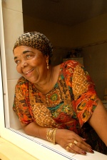 Cezaria Evora in her house, in Mindelo: "As we say in Cape Verde, life consists of poison and honey. Since I took the poison, now, I taste the honey", she tells us.
 © Maro Kouri