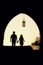 Dodecanese, Rhodes The entrance to the large castle, sunset, couple holding hands
 © Maro Kouri © Maro Kouri