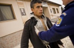 Frontex guards arrest 22-year-old Mohammed on a cold January morning in Nea Vyssa, northern Evros, where temperatures plunge during the winter. The village is a 10-minute drive from the 12.5km land border between Greece and Turkey, where 26,000 migrants passed through last year. Mohammed was found wandering the streets. He says he is from Palestine. Most migrants say they are from countries like Palestine, Afghanistan and Somalia so they won’t be deported
 © Maro Kouri
