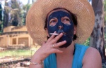 Greek Spas Kyllini, woman in straw hat with  face mud pack smokes a cigarette

©Maro Kouri/IML


 © Maro Kouri