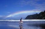 New Zealand, East coast, Ruatoria maori most habbited town.Tuparoa Bay with rainbow Man with ski board.
 © Maro Kouri