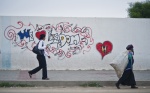 Graffity on the main street of Sidi bou Zid writes ‘‘We love freedom‘‘. The Tunisian revolution started in Sidi bou Zid from the young graduate street-seller Muhammad Buazizi who put himself on fire

 © Maro Kouri